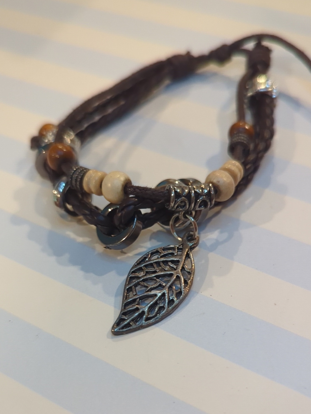 Feather charm and beaded Bracelet Men Or Women Adjustable Boho
